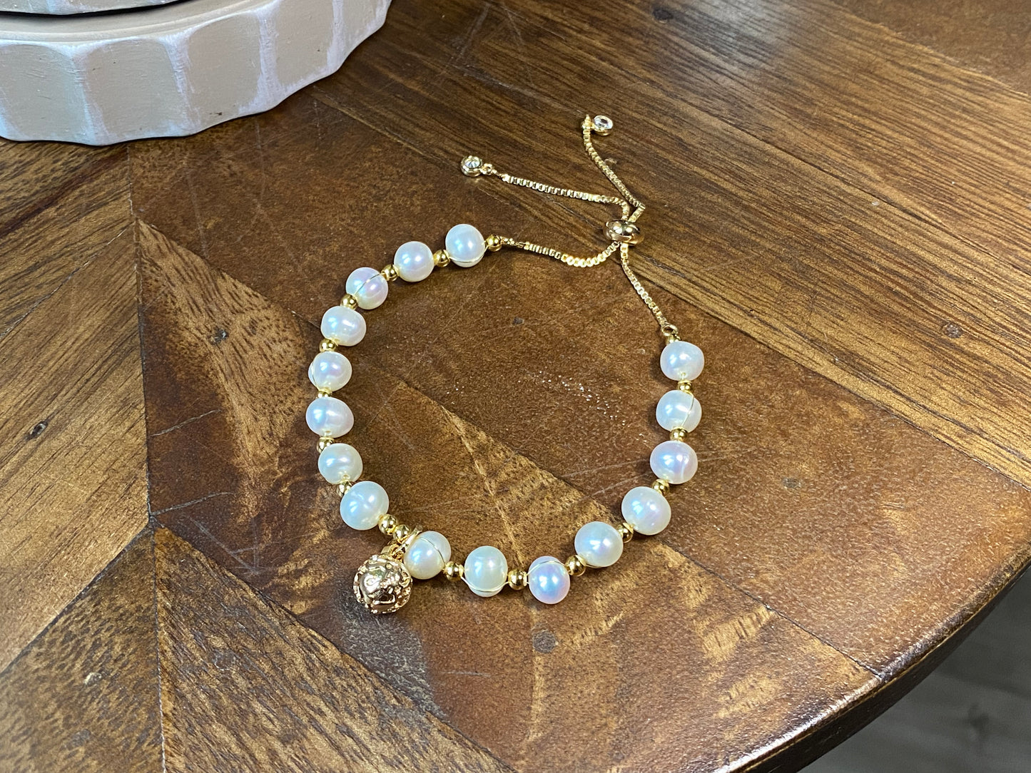 14k pearls bracelet with a cute bell，adjustable length