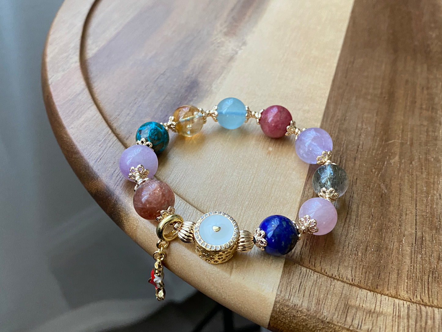 sunstone，rose quartz，Blonde crystal，Turquoise ，Amethyst，Rhodonite，Black Rutilated ，Lapis Lazuli，aquamarine all in one bracelet