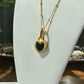 vintage heart shape 18k with black agate and mother of pearl necklace